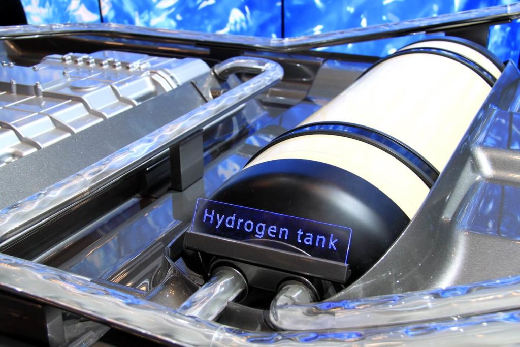 white and black tank containing hydrogen