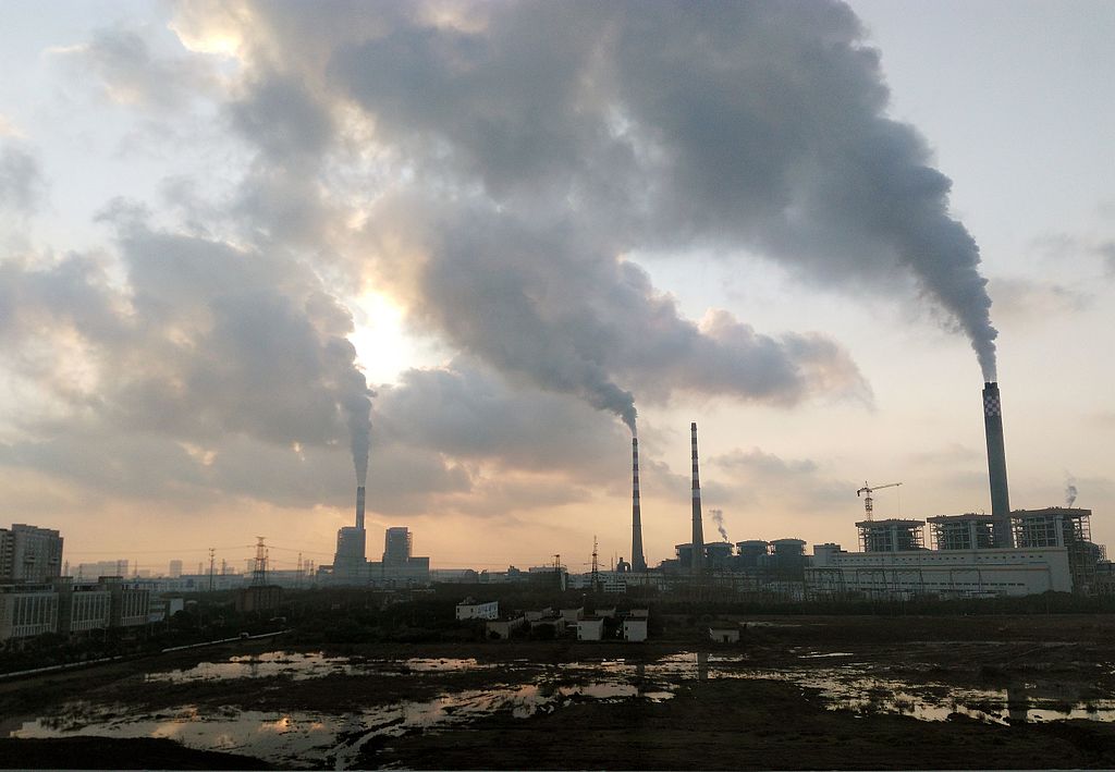 Power station emitting clouds of smoke and pollutants into the air