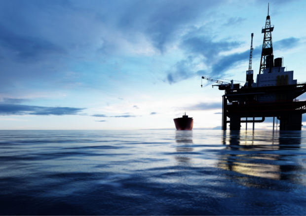 Offshore oil rig at dusk