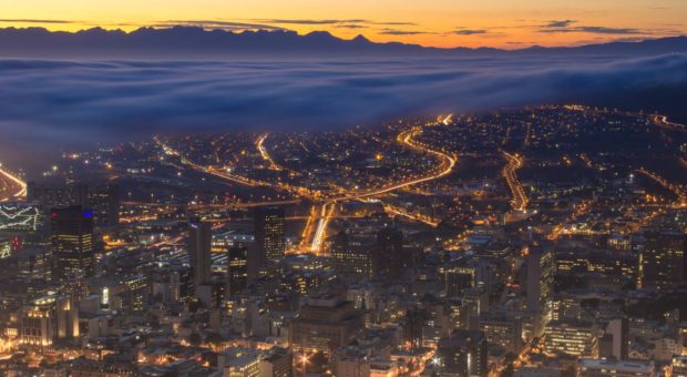 Aerial photo of Cape Town lit up at night